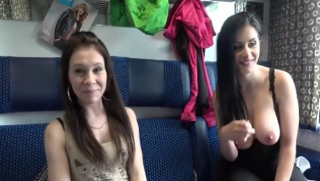 Amateur brunette is sucking a hard dick in the train and riding it, next to her friends