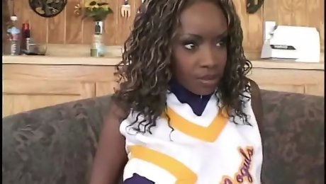 Pretty ebony cheerleader enjoys white cock banging