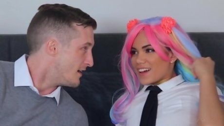 Skinny teen with colorful hair spins on a mighty cock